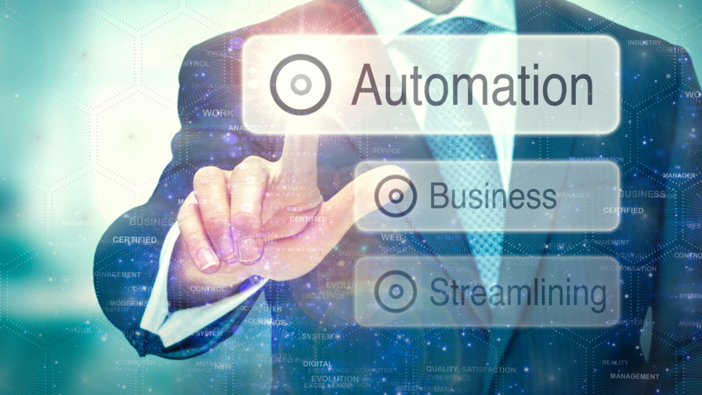 a man pointing to the word automation with 2 other bubbles for business and streamlining. 